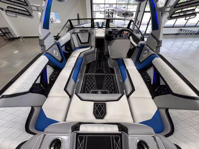 Slide: The Image of Interior of 2021 Tigé 25ZX with luxurious seating. - 13