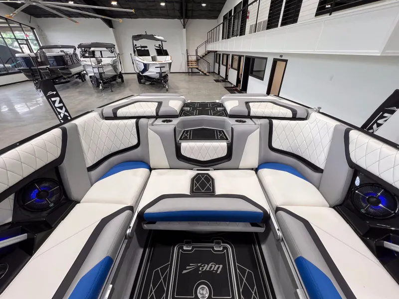 Slide: The Image of Interior of a 2021 Tigé 25ZX boat with luxurious seating. - 17