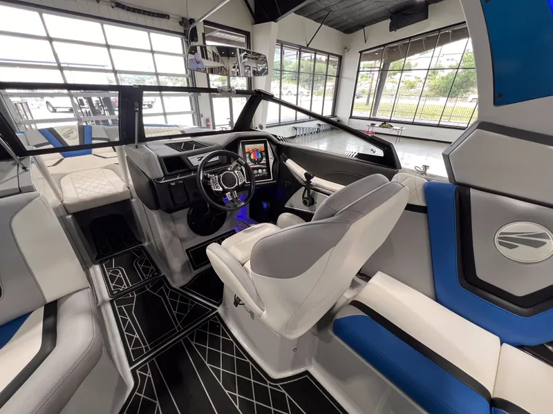 Slide: The Image of Interior of a 2021 Tigé 25ZX boat with modern design. - 19