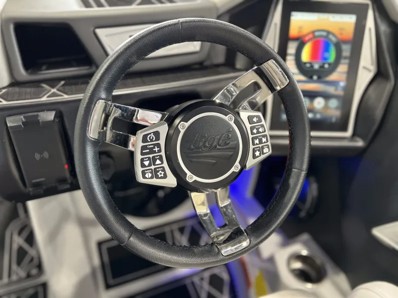 Slide: The Image of 2021 Tigé 25ZX steering wheel with integrated control system. - 20