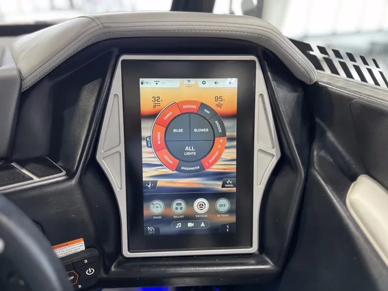 Slide: The Image of 2021 Tigé 25ZX boat control with touchscreen display. - 21