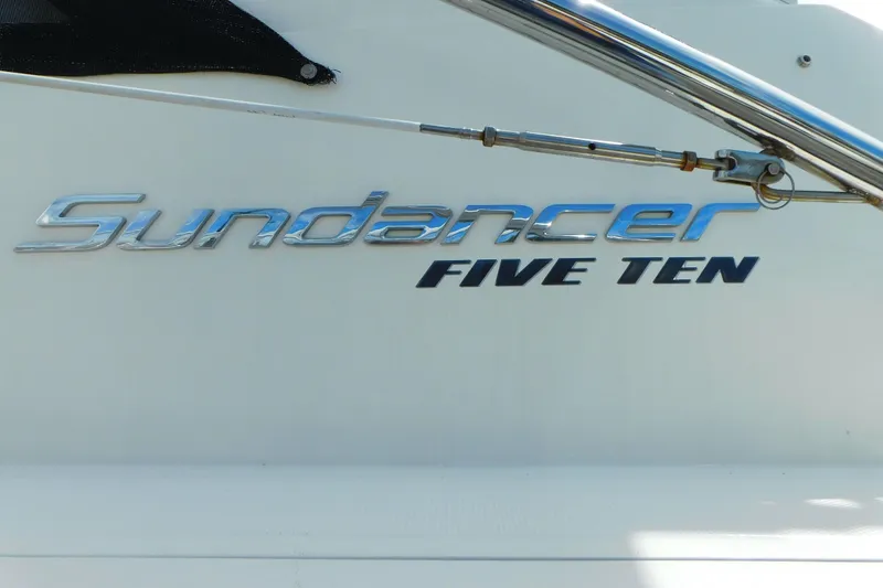 Slide: The Image of 2013 Sea Ray 510 Sundancer boat nameplate with chrome lettering. - 3