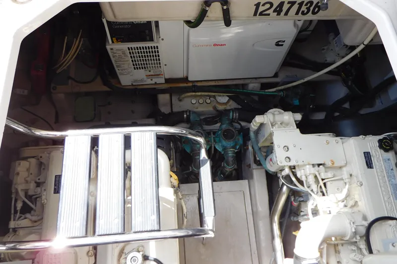 Slide: The Image of Engine room of 2013 Sea Ray 510 Sundancer with Cummins Onan generator. - 68