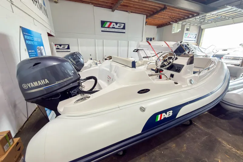Slide: The Image of 2023 AB Inflatables Nautilus 13 boat with Yamaha engine in showroom. - 18