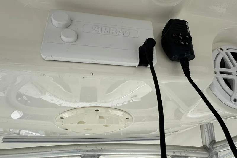 Slide: The Image of 2007 Robalo R300 Center Console with Simrad marine electronics and speaker system. - 11