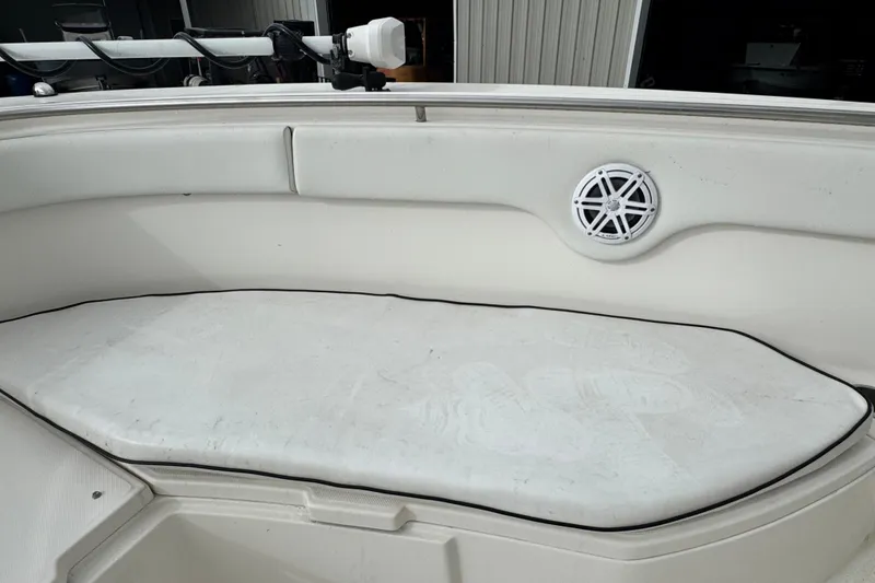 Slide: The Image of 2007 Robalo R300 Center Console boat interior with cushioned seating and speaker. - 15