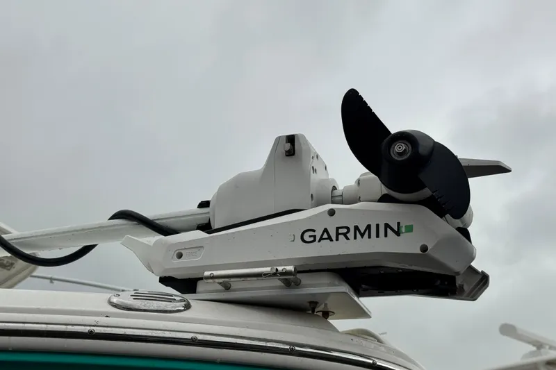 Slide: The Image of Garmin marine equipment on 2007 Robalo R300 Center Console boat against cloudy sky. - 17