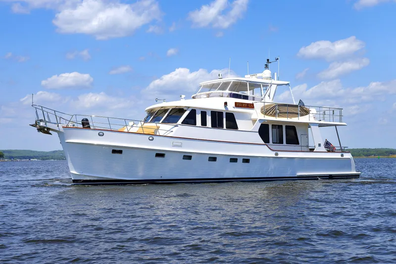 The Image of 2007 Grand Banks 59 Aleutian RP yacht cruising on a sunny day. - 0