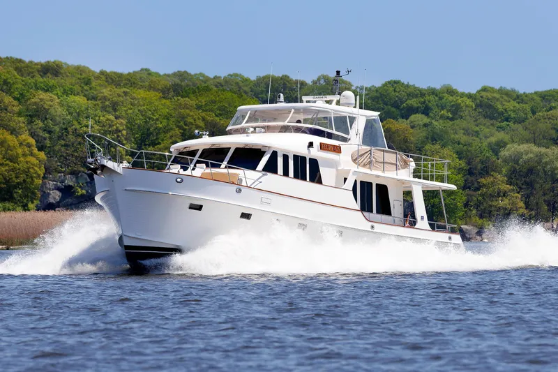 Slide: The Image of Grand Banks 59 Aleutian RP 2007 yacht cruising on a scenic waterway. - 103