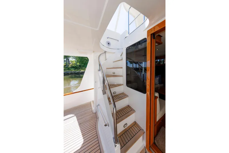 Slide: The Image of Staircase on 2007 Grand Banks 59 Aleutian RP yacht, leading to upper deck. - 11