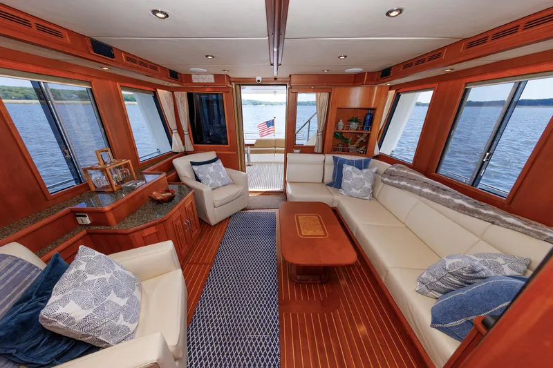 Slide: The Image of Luxurious interior of 2007 Grand Banks 59 Aleutian RP yacht with elegant seating and wood finishes. - 2