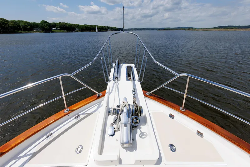 Slide: The Image of Bow view of 2007 Grand Banks 59 Aleutian RP yacht on calm waters. - 29