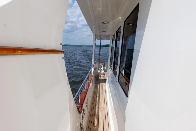 Slide: The Image of Side deck view of 2007 Grand Banks 59 Aleutian RP yacht on open water. - 34