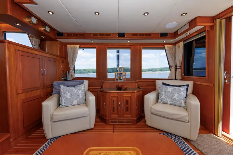 Slide: The Image of Luxurious 2007 Grand Banks 59 Aleutian RP yacht interior with elegant seating and wood finishes. - 37