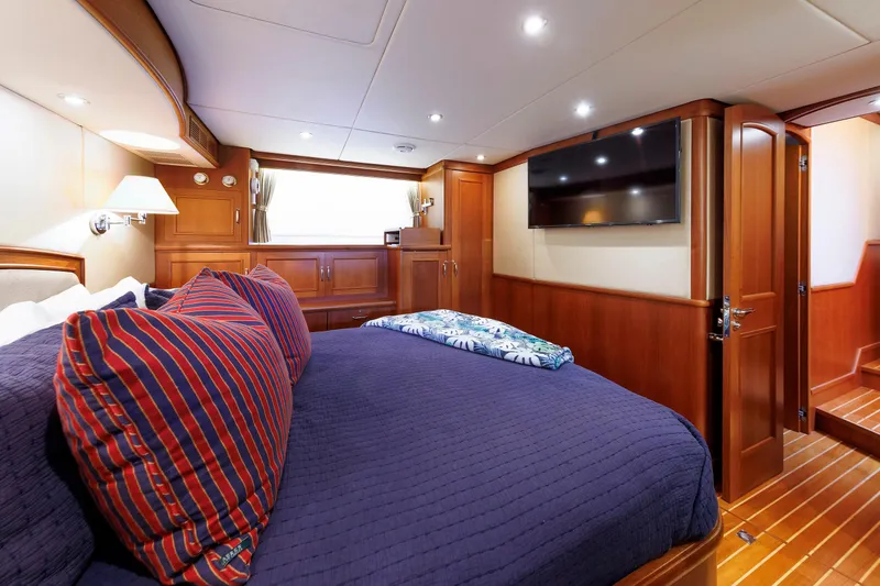 Slide: The Image of Luxurious cabin interior of 2007 Grand Banks 59 Aleutian RP yacht with wood paneling. - 58