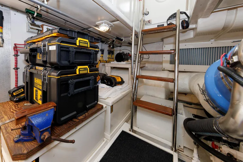 Slide: The Image of Engine room of 2007 Grand Banks 59 Aleutian RP with tools and equipment. - 67
