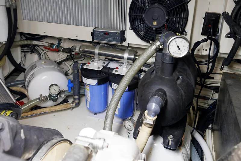 Slide: The Image of Engine room of 2007 Grand Banks 59 Aleutian RP with filtration system and gauges. - 78
