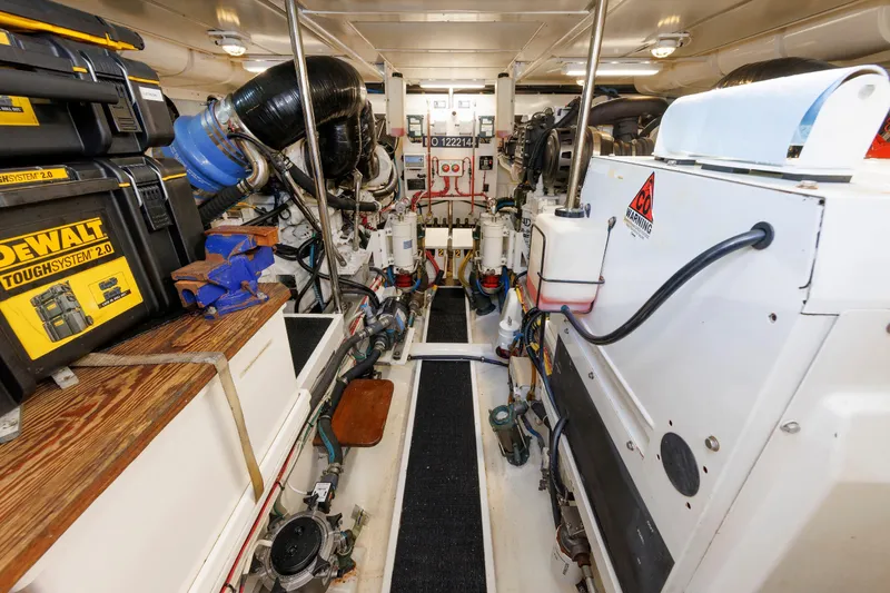 Slide: The Image of Engine room of 2007 Grand Banks 59 Aleutian RP yacht, featuring tools and equipment. - 79