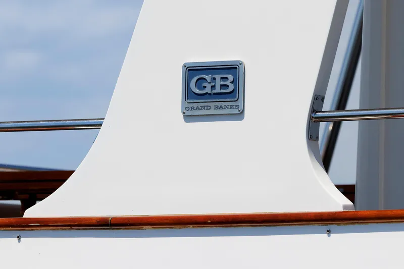 Slide: The Image of Grand Banks 59 Aleutian RP 2007 yacht detail with logo and railing. - 90