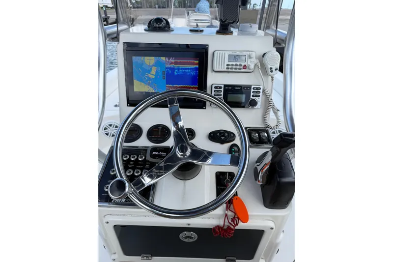 Slide: The Image of Center console of a 2012 Pathfinder 2200 TRS boat with navigation equipment. - 19