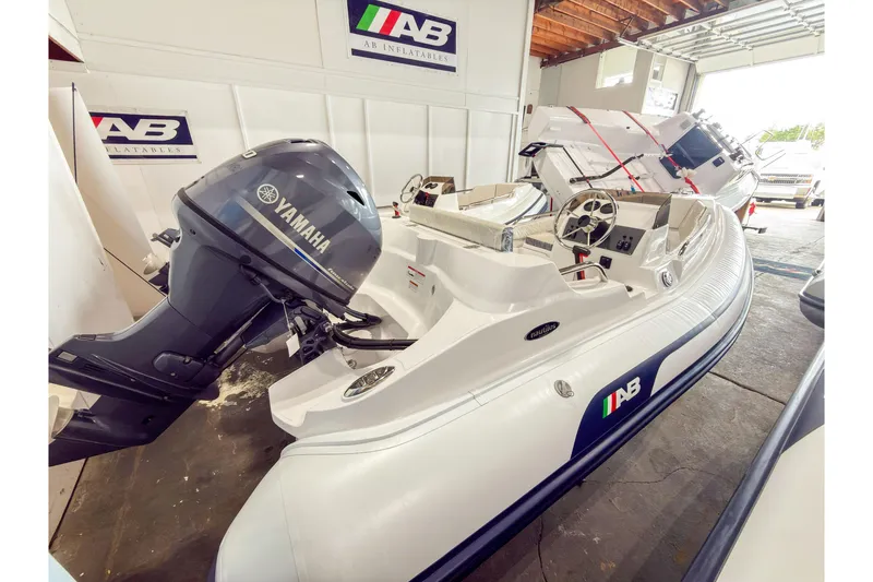 Slide: The Image of 2024 AB Inflatables Nautilus 13 boat with Yamaha engine in showroom. - 3