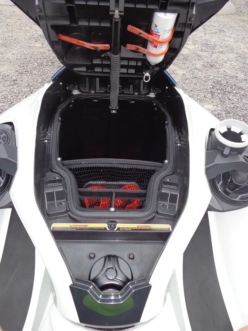 Slide: The Image of 2023 Sea-Doo FishPro Sport 170 storage compartment with open lid. - 11