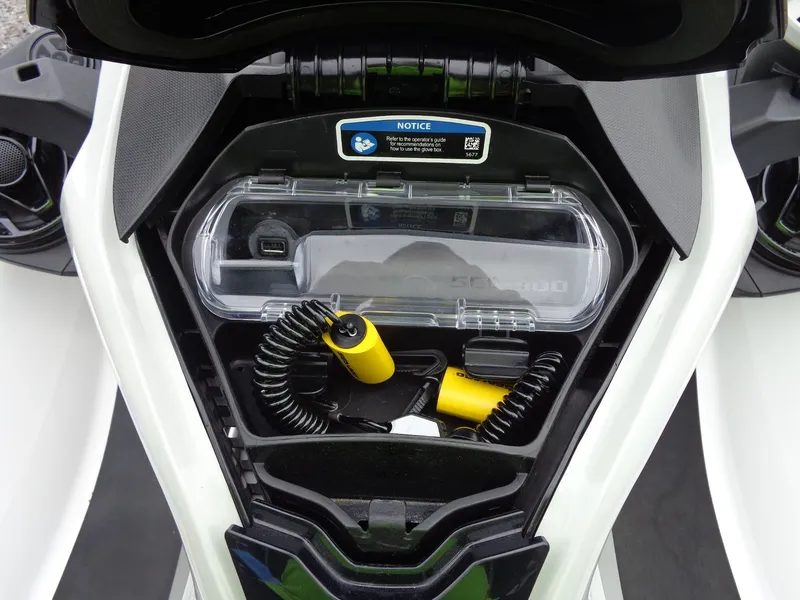 Slide: The Image of 2023 Sea-Doo FishPro Sport 170 storage compartment with accessories. - 13
