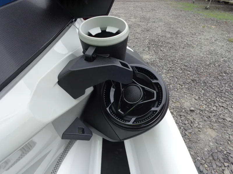Slide: The Image of Sea-Doo FishPro 2023 speaker system and cup holder close-up. - 8