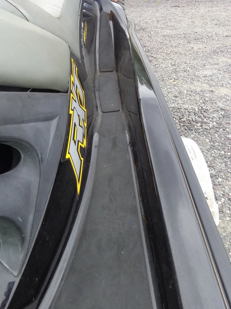 Slide: The Image of Close-up of a 2007 Sea-Doo RXT™ jet ski on gravel. - 11