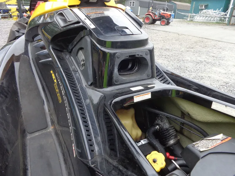 Slide: The Image of 2007 Sea-Doo RXT™ jet ski with open engine compartment. - 16