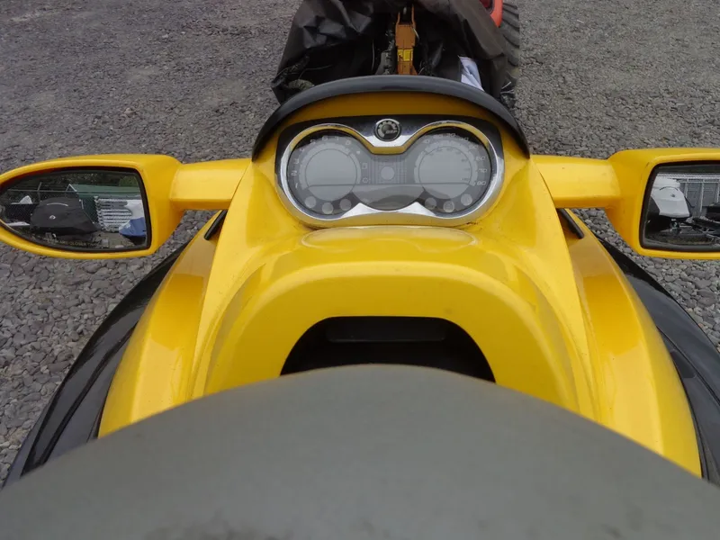 Slide: The Image of 2007 Sea-Doo RXT™ cockpit view with yellow body. - 18