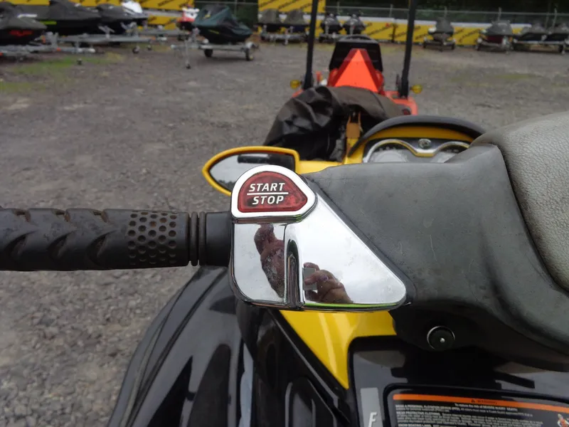 Slide: The Image of Close-up of the start-stop button on a 2007 Sea-Doo RXT™ jet ski. - 25