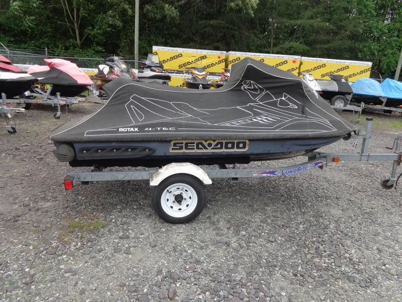 Slide: The Image of 2007 Sea-Doo RXT™ jet ski with cover on trailer. - 29