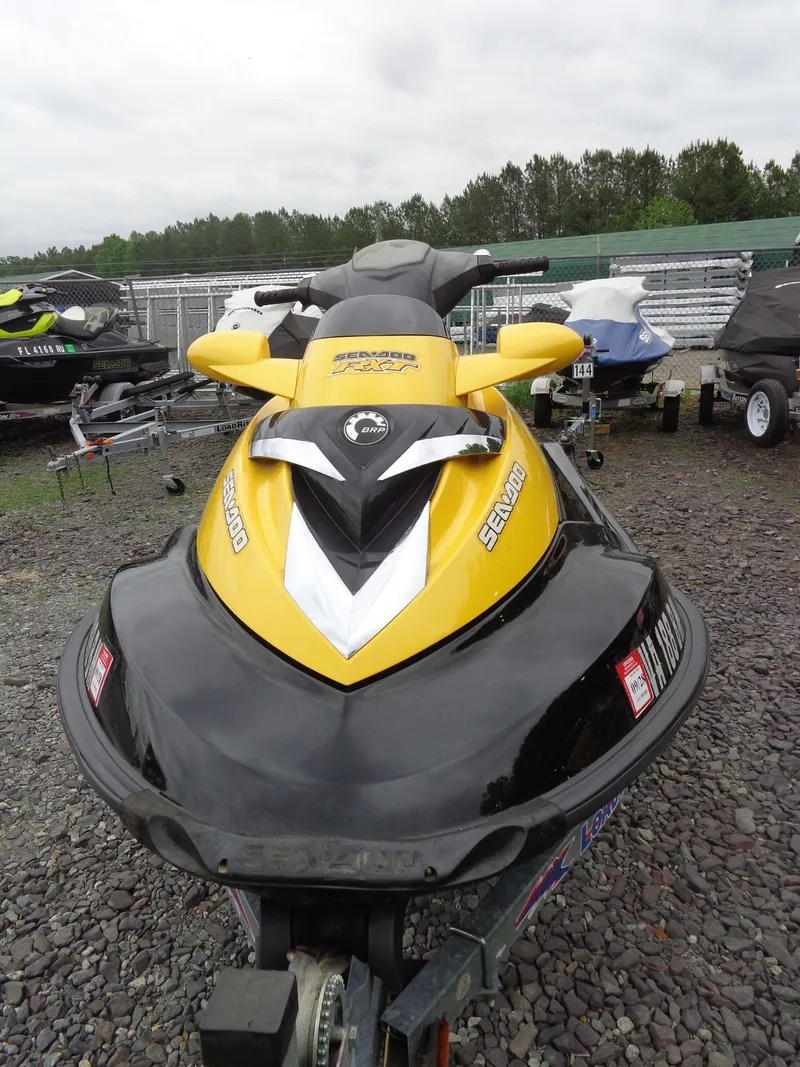 Slide: The Image of 2007 Sea-Doo RXT™ jet ski in yellow and black on trailer. - 3