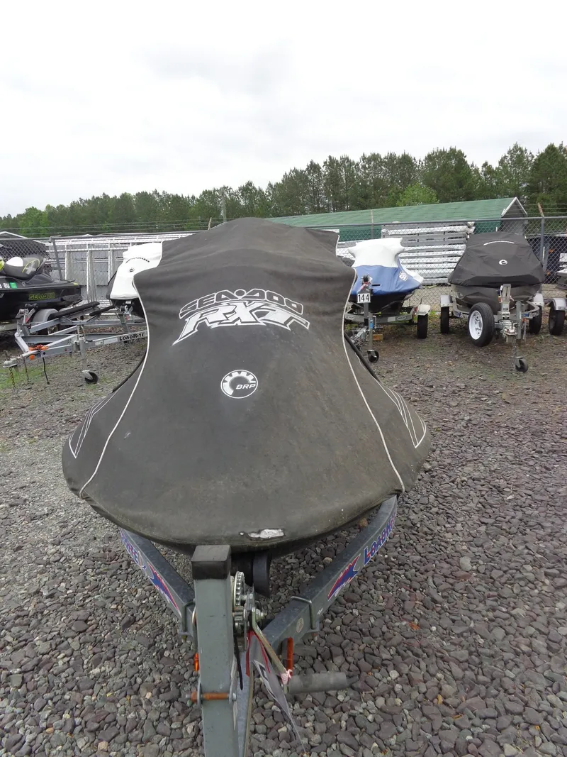 Slide: The Image of 2007 Sea-Doo RXT™ jet ski covered on trailer. - 30