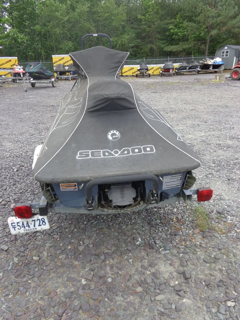 Slide: The Image of 2007 Sea-Doo RXT™ with cover on trailer, parked outdoors. - 31