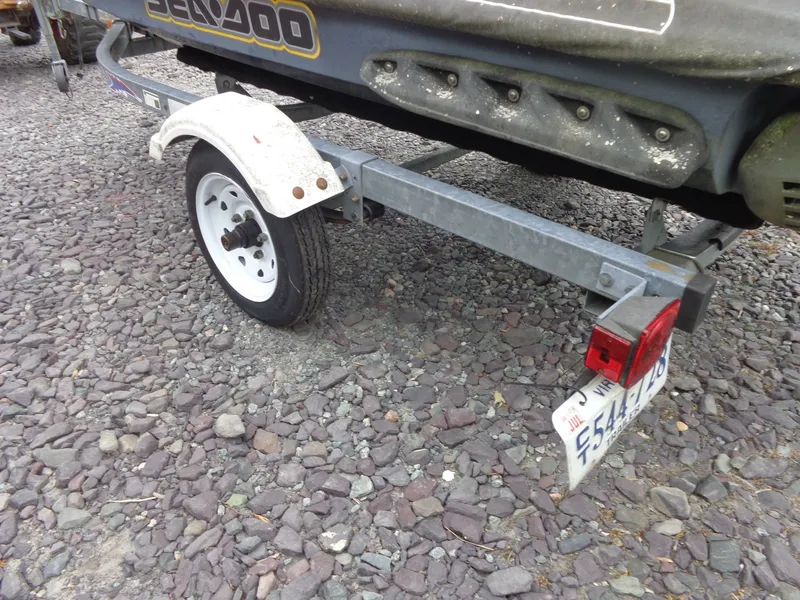 Slide: The Image of 2007 Sea-Doo RXT on trailer with license plate. - 35