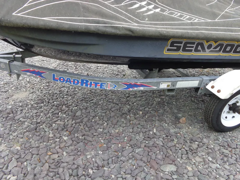 Slide: The Image of 2007 Sea-Doo RXT on LoadRite trailer, covered. - 36