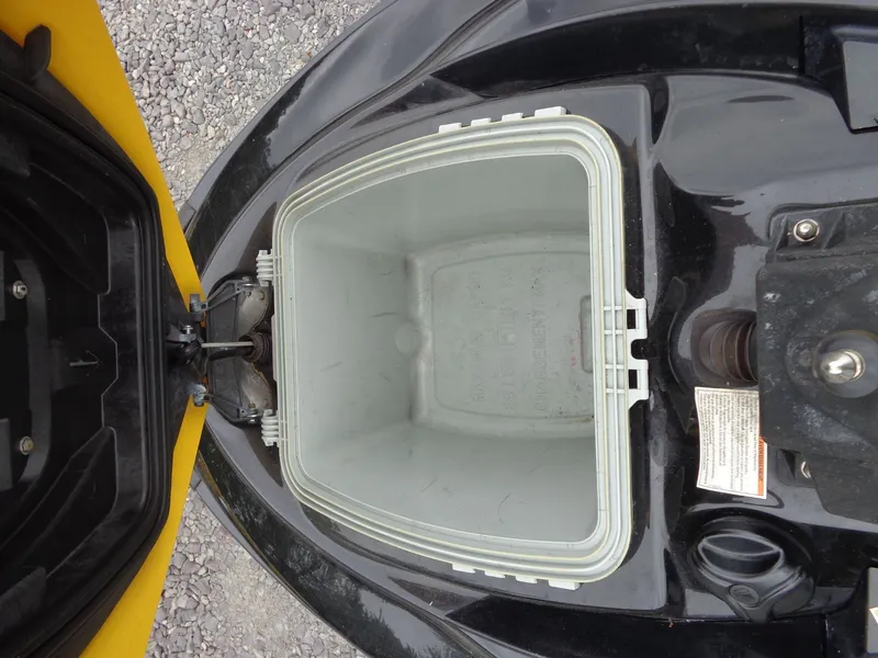Slide: The Image of Open storage compartment of a 2007 Sea-Doo RXT™ jet ski. - 38