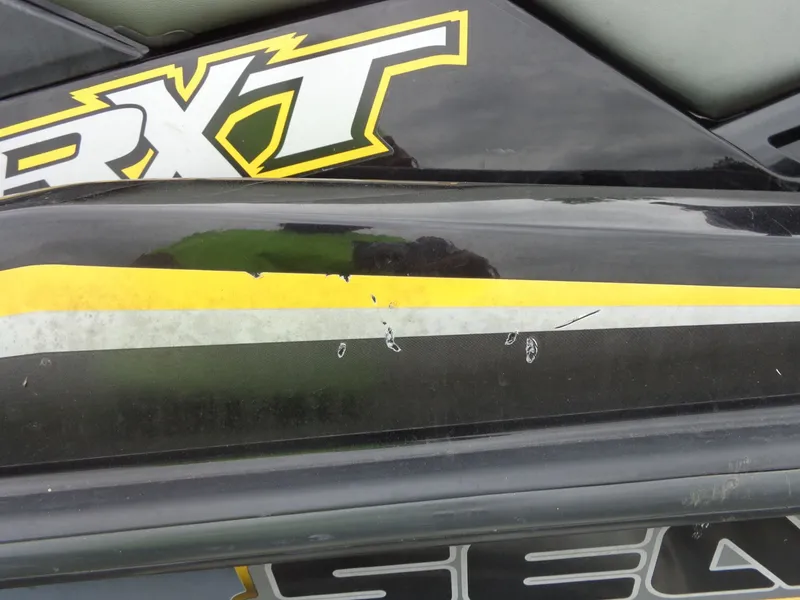 Slide: The Image of Close-up of a 2007 Sea-Doo RXT™ with scratches. - 4