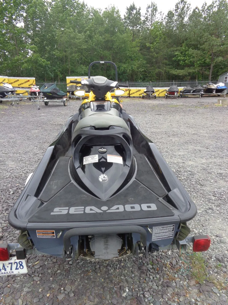 Slide: The Image of 2007 Sea-Doo RXT™ jet ski parked on trailer outdoors. - 5
