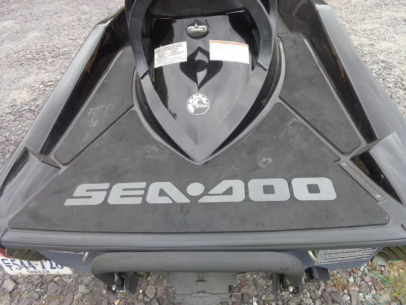 Slide: The Image of 2007 Sea-Doo RXT™ jet ski on gravel surface. - 6