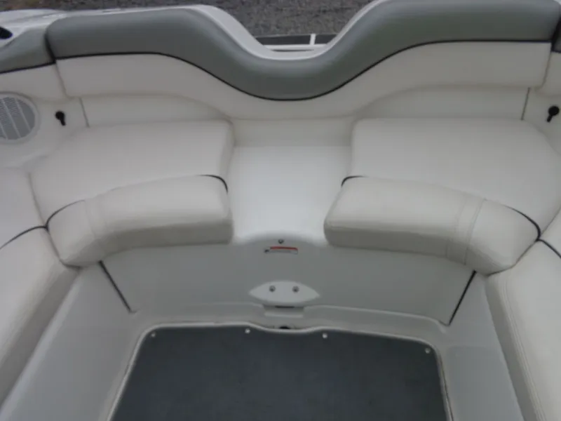 Slide: The Image of Interior of a 2008 Yamaha AR210 boat with white seating. - 15