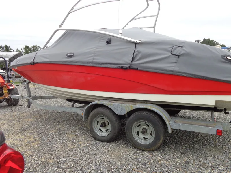 Slide: The Image of 2008 Yamaha AR210 boat on trailer with cover. - 2