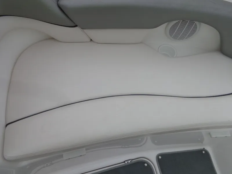 Slide: The Image of Interior of a 2008 Yamaha AR210 boat with gray upholstery. - 20