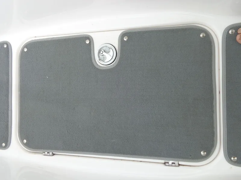 Slide: The Image of Yamaha AR210 2008 boat hatch with gray cover. - 38