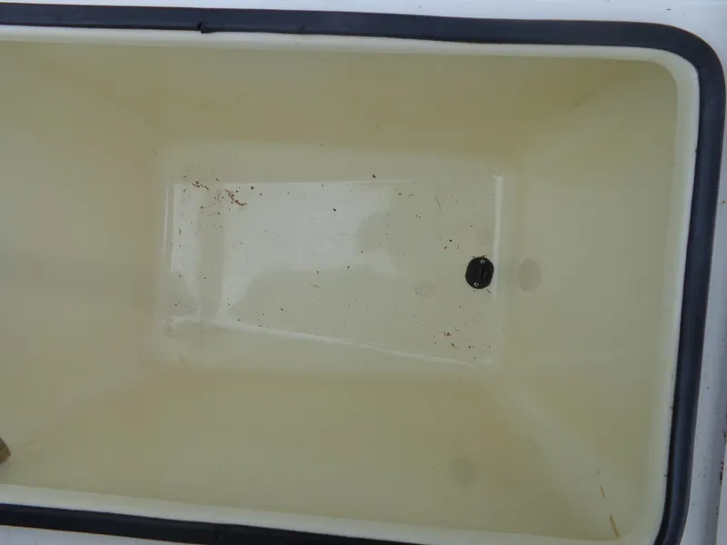 Slide: The Image of Interior of a 2008 Yamaha AR210 boat compartment. - 39
