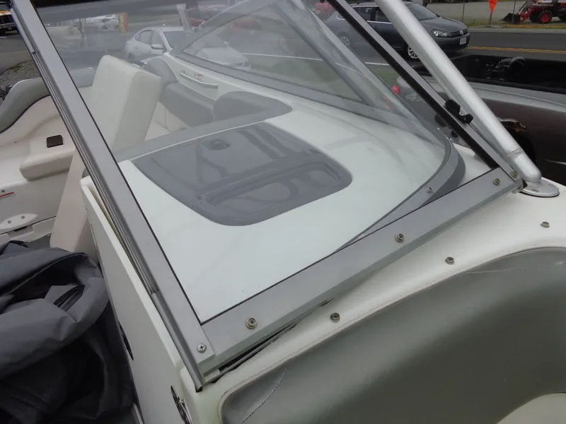 Slide: The Image of 2008 Yamaha AR210 boat cockpit with windshield. - 42