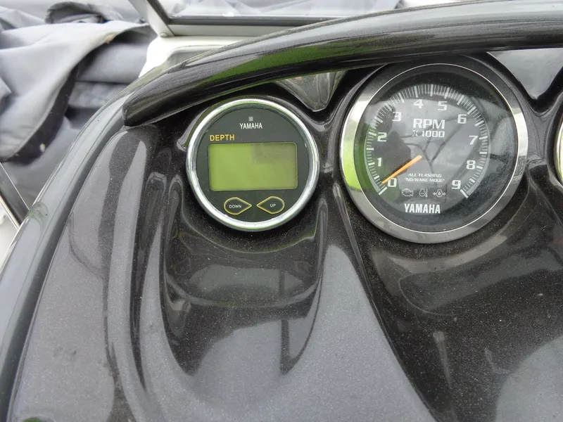 Slide: The Image of Dashboard of a 2008 Yamaha AR210 boat with tachometer. - 46