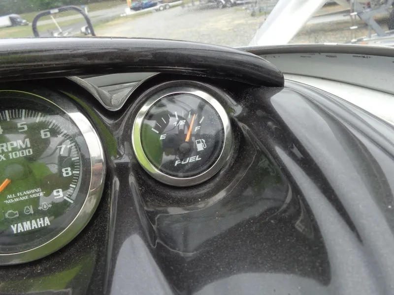 Slide: The Image of Yamaha AR210 2008 boat tachometer and fuel gauge. - 48
